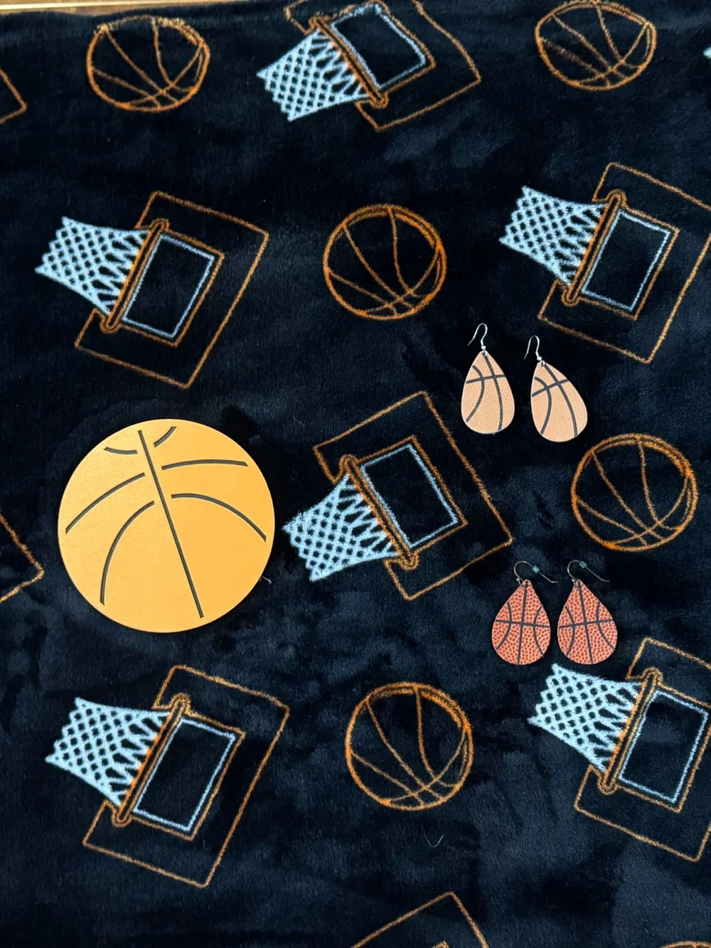 Basketball earrings, blankets & wooden home decor